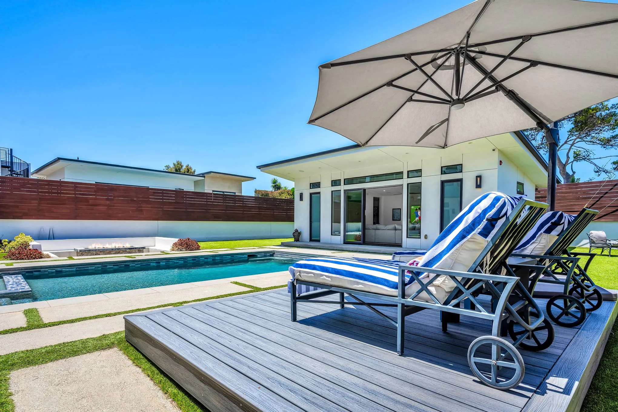 Covered alfresco dining by the pool